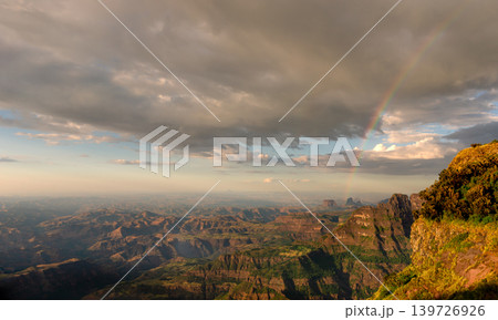 Rainbow over Simien Mountains canyon landscape in Ethiopia Rainbow over Simien Mountains canyon landscape in Ethiopia 139726926
