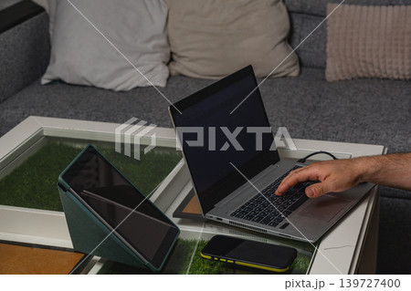 Modern workspace with laptop on coffee table 139727400