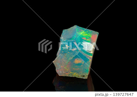 macro mineral stone rare and beautiful opals on a black background 139727647