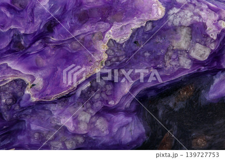 macro mineral stone Charoite on a white background macro mineral stone Charoite on a white background 139727753
