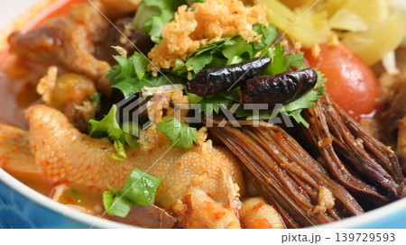 rice vermicelli with northern thai curry sauce on blue background 139729593