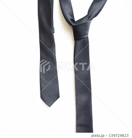 black necktie isolated on white background, father day concept and business style black necktie isolated on white background, father day concept and business style 139729623