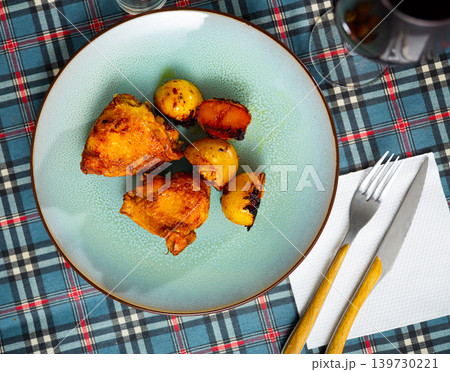 chicken with baked potatoes chicken with baked potatoes 139730221