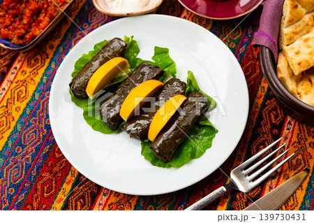 Traditional Turkish Sarma, wrapped vine leaves stuffed with rice Traditional Turkish Sarma, wrapped vine leaves stuffed with rice 139730431