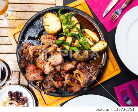 Chuleton is a popular Spanish dish made from a beef steak Chuleton is a popular Spanish dish made from a beef steak 139730751