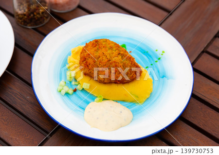 Traditional Russian dish - Pozhanskaya cutlet with mashed potatoes closeup Traditional Russian dish - Pozhanskaya cutlet with mashed potatoes closeup 139730753