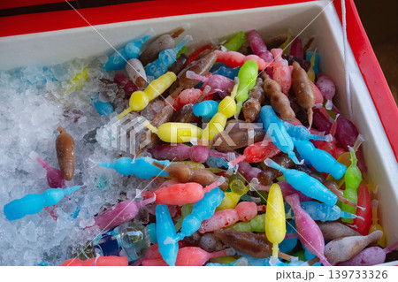 Colorful ice sweet water chilled in an ice box. Enjoy on a very hot day. Colorful ice sweet water chilled in an ice box. Enjoy on a very hot day. 139733326