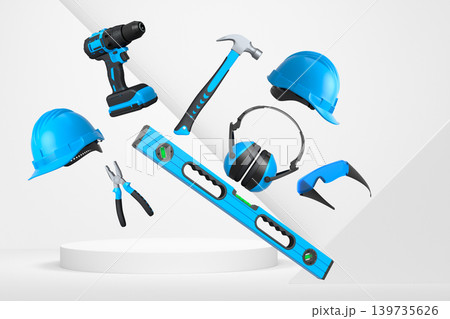 Construction tools and safety equipment floating over podium on abstract background, industrial work and protection concept Construction tools and safety equipment floating over podium on abstract background, industrial work and protection concept 139735626