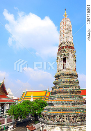 Giant stupa in Buddhist Temple of Dawn Wat Arun, sightseeing landmark of Bangkok, Thailand. Famous tourist attraction. Summer vacation, relaxing, topic of travel, trip, cruises, tour Giant stupa in Buddhist Temple of Dawn Wat Arun, sightseeing landmark of Bangkok, Thailand. Famous tourist attraction. Summer vacation, relaxing, topic of travel, trip, cruises, tour 139736861