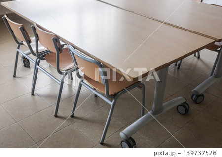 School Desks And Chairs In Empty Classroom 139737526