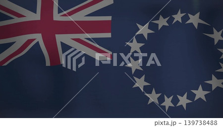Waving navy-blue Cook Islands flag filling frame, showing Union Jack, fifteen stars, stitched folds Waving navy-blue Cook Islands flag filling frame, showing Union Jack, fifteen stars, stitched folds 139738488