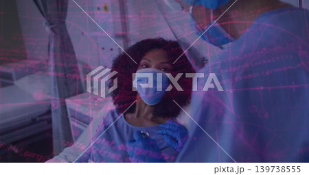 Receiving woman in gown in clinic chair, nurse in scrubs giving injection with syringe and gloves Receiving woman in gown in clinic chair, nurse in scrubs giving injection with syringe and gloves 139738555