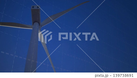 Filling frame wind turbine tower rising at wind farm, showing nacelle, three blades, blade mounts Filling frame wind turbine tower rising at wind farm, showing nacelle, three blades, blade mounts 139738691