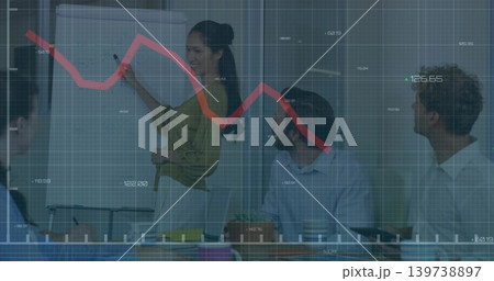 Writing presenter in green blouse pointing at flip chart in meeting room, with marker, red overlay Writing presenter in green blouse pointing at flip chart in meeting room, with marker, red overlay 139738897