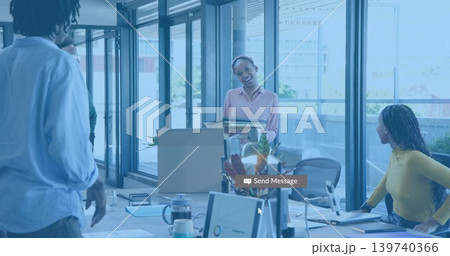 Presenting folders standing woman engaging team in office wearing collared shirt with cardboard box Presenting folders standing woman engaging team in office wearing collared shirt with cardboard box 139740366
