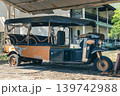 A rusty and abandoned Large multi-seat tuk tuk taxi for tourists in an abandoned hotel. The ruin and bankruptcy of the tourism business during the pandemic and crises. High quality photo 139742988