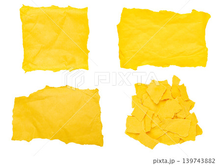 Set of torn yellow paper pieces and scraps isolated on white background 139743882
