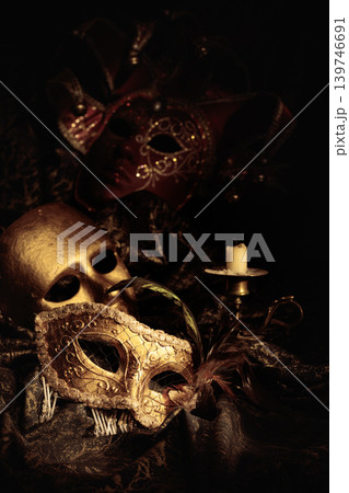 Golden carnival masks on a dark background. Golden carnival masks on a dark background. 139746691