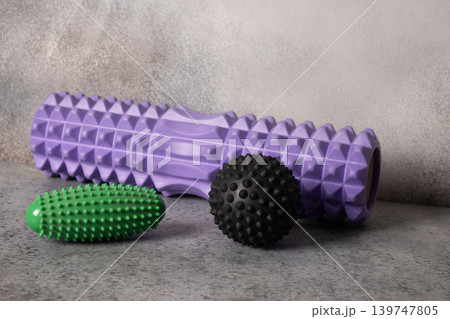 Massage tools for muscle recovery on neutral background Massage tools for muscle recovery on neutral background 139747805