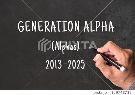 Generation Alpha written on blackboard with hand, Alphas born 2013 to 2025, generational demographics and social research concept Generation Alpha written on blackboard with hand, Alphas born 2013 to 2025, generational demographics and social research concept 139748735
