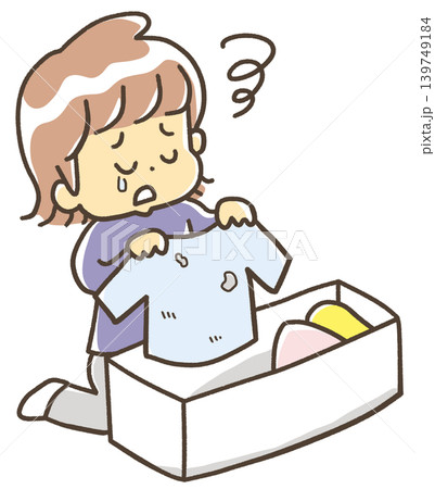 衣替えで取り出した服に虫食いがあって悲しんでいる人 139749184