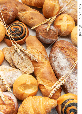 Variety of fresh baked bread, pastry, and wheat ears Variety of fresh baked bread, pastry, and wheat ears 139749385