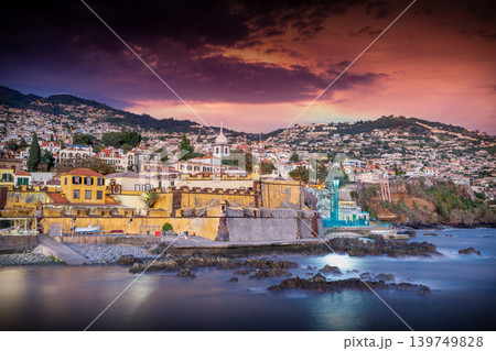 Funchal Skyline and Sea Fort at Magenta Sunset from the Ocean Funchal Skyline and Sea Fort at Magenta Sunset from the Ocean 139749828