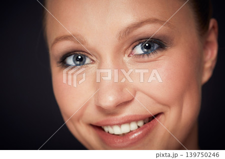 Portrait, makeup or happy woman with smile for beauty, skincare or wellness on black background. Cosmetic, face and female model with glowing skin confidence, shine or result satisfaction in studio Portrait, makeup or happy woman with smile for beauty, skincare or wellness on black background. Cosmetic, face and female model with glowing skin confidence, shine or result satisfaction in studio 139750246