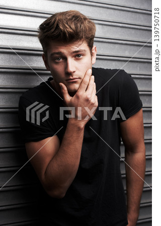 Serious, man and cool portrait with fashion or style on metal background with grunge aesthetic. Confident, person and casual outfit for urban, city and streetwear on wall backdrop in town at night Serious, man and cool portrait with fashion or style on metal background with grunge aesthetic. Confident, person and casual outfit for urban, city and streetwear on wall backdrop in town at night 139750718