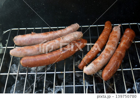 Closeup of pork sausages on the barbecue 139750780