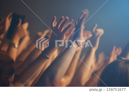 Hands, crowd and celebration or friends at music festival, collaboration and freedom at nightclub. People, closeup and weekend at party or social event, concert and community or together at show Hands, crowd and celebration or friends at music festival, collaboration and freedom at nightclub. People, closeup and weekend at party or social event, concert and community or together at show 139751677
