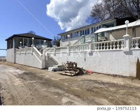 a coastal property undergoing renovation or construction. Construction materials a coastal property undergoing renovation or construction. Construction materials 139752113