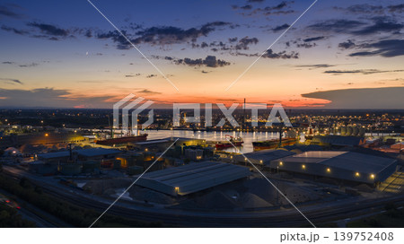 Drone view showcasing its chemical, petrochemical, and port industries at night 139752408