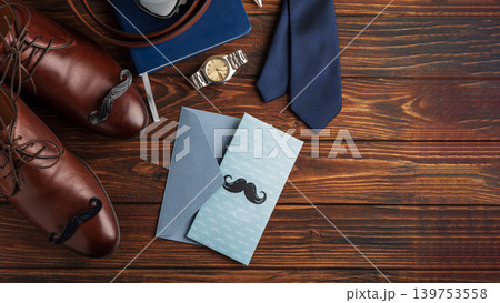 Father's Day concept flat lay with greeting card and accessories Father's Day concept flat lay with greeting card and accessories 139753558