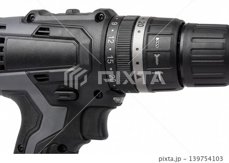 Detailed close up of a cordless drill showing torque adjustment ring and chuck, isolated on a white background. Ideal for construction, repair, DIY, hardware, and power tool concepts. Detailed close up of a cordless drill showing torque adjustment ring and chuck, isolated on a white background. Ideal for construction, repair, DIY, hardware, and power tool concepts. 139754103