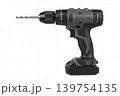 Modern cordless drill with metal drill bit isolated on white background. Professional power tool for drilling, repair, construction, installation, maintenance, workshop and DIY tasks. 139754135