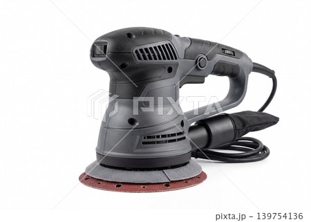 Modern random orbital sander with sanding disc and dust bag isolated on white background. Electric power tool for woodworking, polishing, finishing, renovation, repair and workshop use. Modern random orbital sander with sanding disc and dust bag isolated on white background. Electric power tool for woodworking, polishing, finishing, renovation, repair and workshop use. 139754136