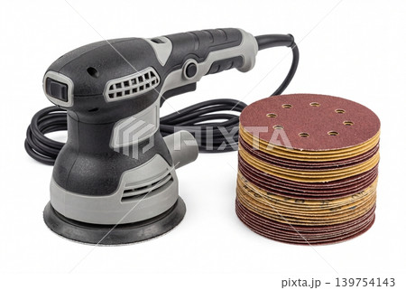 Electric orbital sander with stacked abrasive sanding discs isolated on white background. Professional power tool for woodworking, surface finishing, renovation, repair, and DIY projects. Electric orbital sander with stacked abrasive sanding discs isolated on white background. Professional power tool for woodworking, surface finishing, renovation, repair, and DIY projects. 139754143