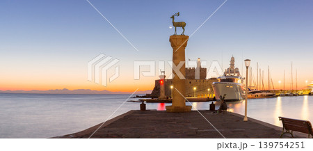 Deer statues and marina harbor at sunrise in Rhodes Old Town Greece 139754251