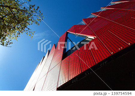 Exterior view of Horacka multifunctional arena in Jihlava, Vysocina region, Czechia, on a sunny day, showing modern architecture from open public surroundings Exterior view of Horacka multifunctional arena in Jihlava, Vysocina region, Czechia, on a sunny day, showing modern architecture from open public surroundings 139754594