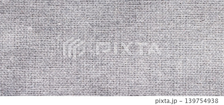 Light gray woven linen fabric texture with natural melange fiber surface as a horizontal background Light gray woven linen fabric texture with natural melange fiber surface as a horizontal background 139754938