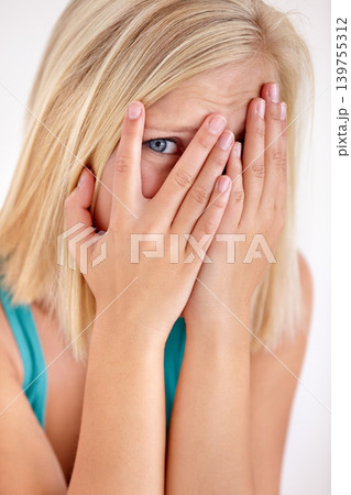 Scared, portrait and woman with hands on face, fear and confused with trauma in horror studio. Panic, scary danger and shocked embarrassed girl with stress, anxiety and terror on white background. Scared, portrait and woman with hands on face, fear and confused with trauma in horror studio. Panic, scary danger and shocked embarrassed girl with stress, anxiety and terror on white background. 139755312