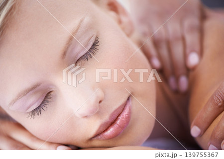 Woman, relax and back massage in spa for health, wellness and peace with hands for physical therapy. Person, comfort and masseuse for body treatment with zen, rest and detox on bed in holiday resort Woman, relax and back massage in spa for health, wellness and peace with hands for physical therapy. Person, comfort and masseuse for body treatment with zen, rest and detox on bed in holiday resort 139755367
