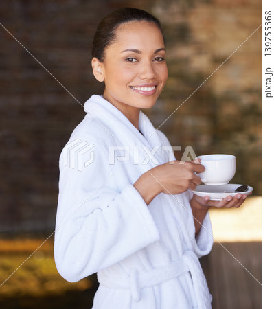 Woman, portrait and spa with morning coffee, hotel and bathrobe from wellness and skincare treatment. Espresso, happy and smile from tea cup and health with hospitality at lodge with luxury and care Woman, portrait and spa with morning coffee, hotel and bathrobe from wellness and skincare treatment. Espresso, happy and smile from tea cup and health with hospitality at lodge with luxury and care 139755368
