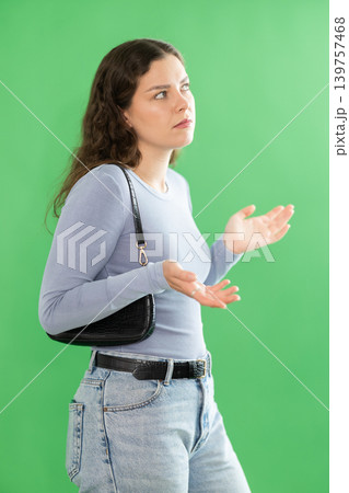 Discouraged or puzzled female person is trying to recall necessary information 139757468