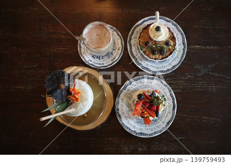 Artisanal Desserts and Drinks on Wooden Table Artisanal Desserts and Drinks on Wooden Table 139759493