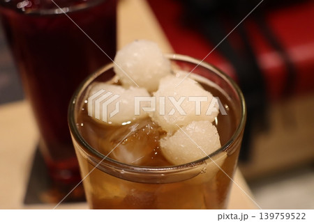 Iced Beverage with Tapioca Pearls in Glass 139759522