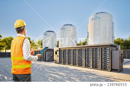 Engineer or technician work at small modular nuclear reactors Engineer or technician work at small modular nuclear reactors 139760553