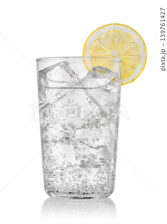 Glass of sparkling water featuring lemon slices and cubes ice isolated on white background Glass of sparkling water featuring lemon slices and cubes ice isolated on white background 139761427