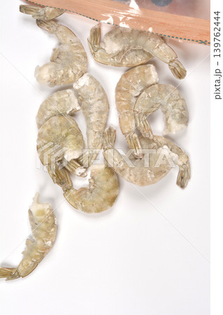 Frozen Raw Tiger Prawns on White Background 139762444